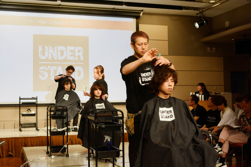 全国理容生活衛生同業組合連合会（全理連）中央講師会が開催する「Hair Creation 2025」で発表されたヘアトレンドのテーマは「UNDERSTAND」